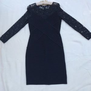 Knee length black cocktail dress